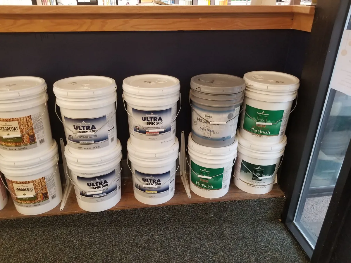 Benjamin Moore paint colour chips on the Debsan paint counter